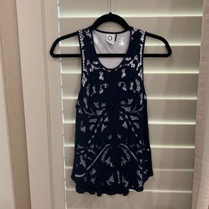 Navy and white sleeveless top from Anthropologie